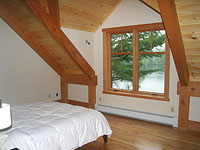 bed with view of lake